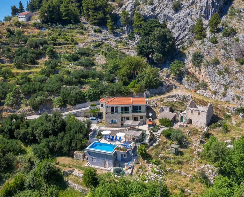 Villa Makar exterior, pool terrace, and Biokovo mountain view photo 2